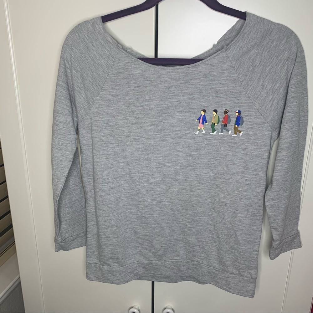 Junior’s Stranger Things Graphic Torn Neck Thin Sweatshirt